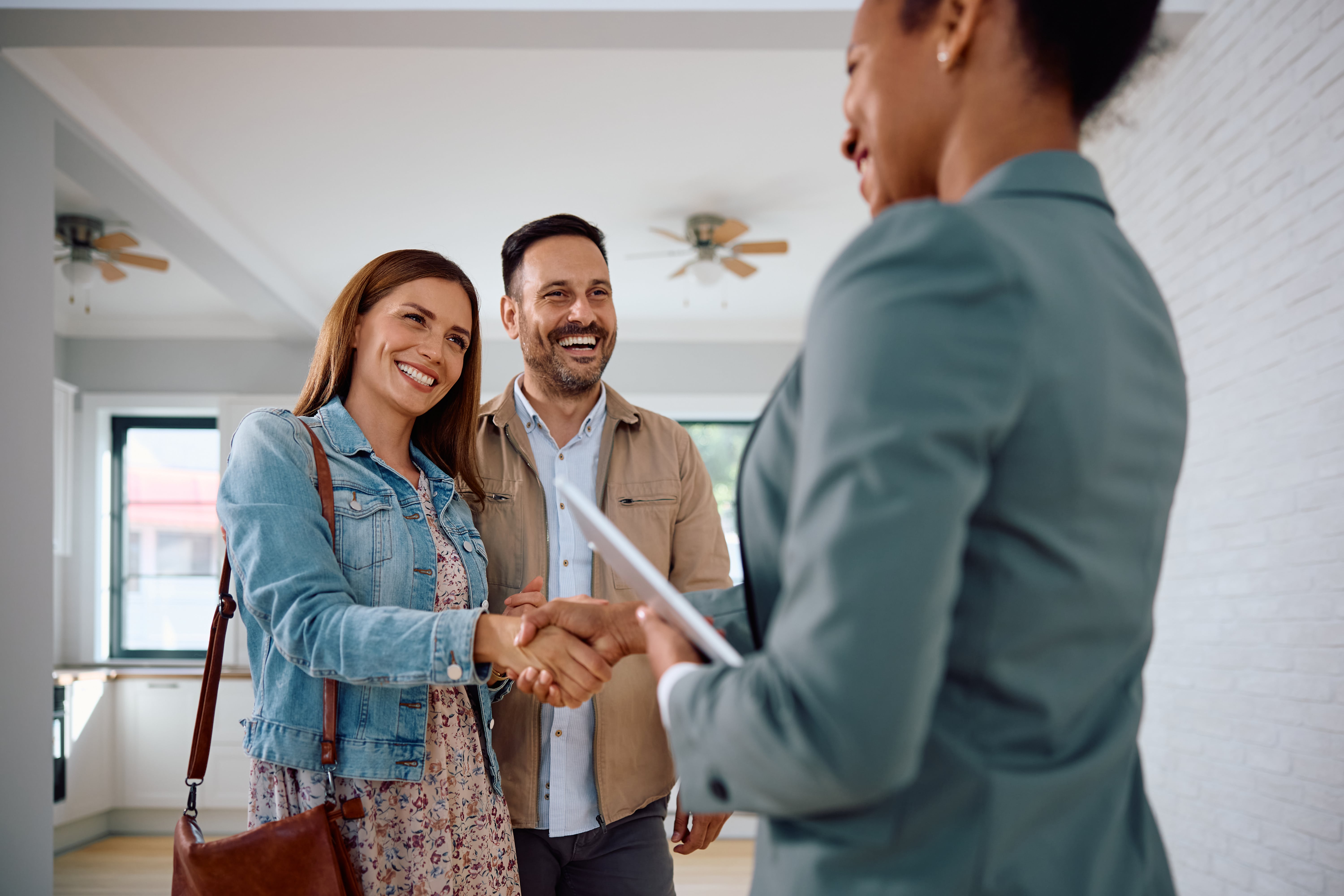 Real estate Agent Talking to a Family