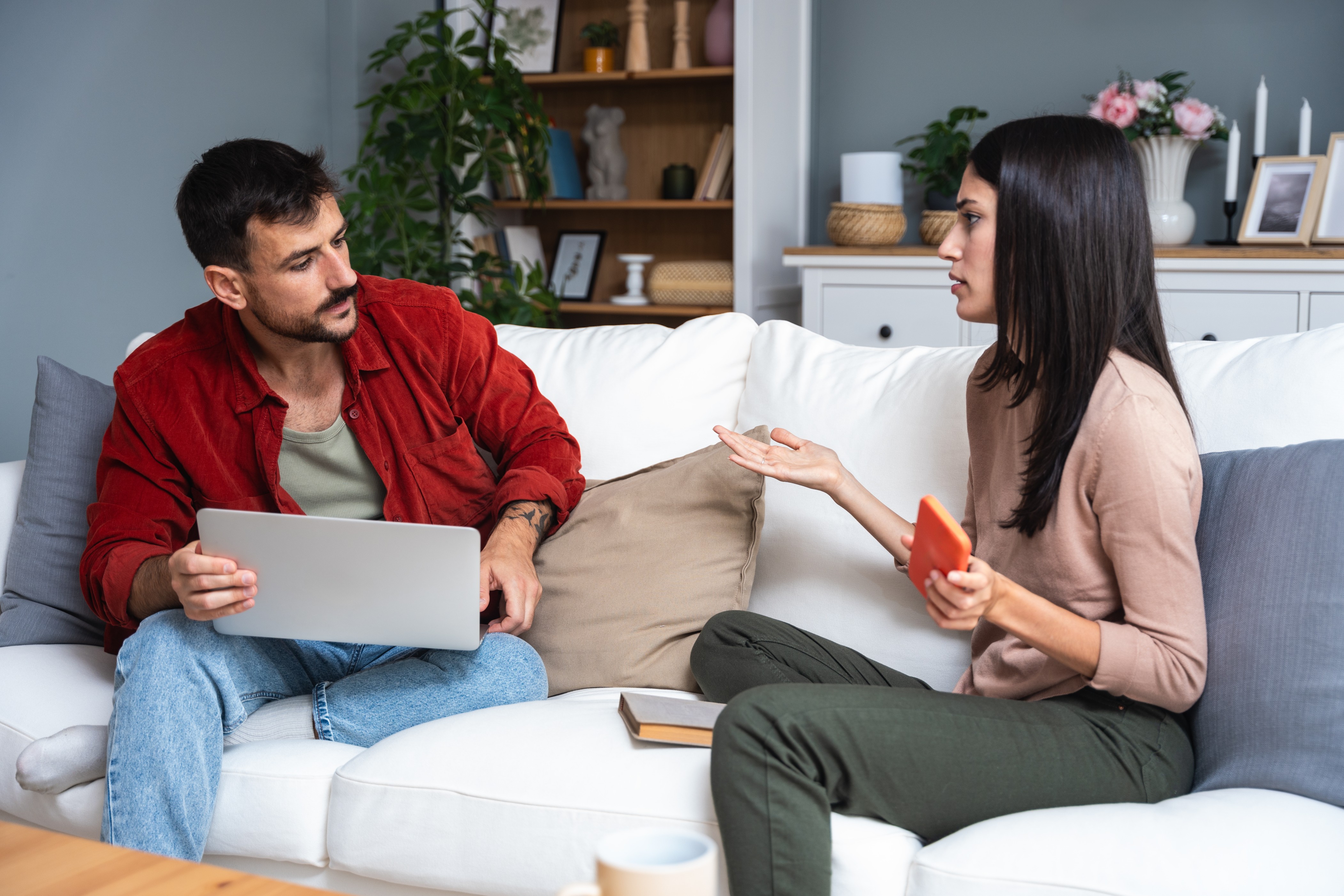 Husband and wife discussing rental disputes