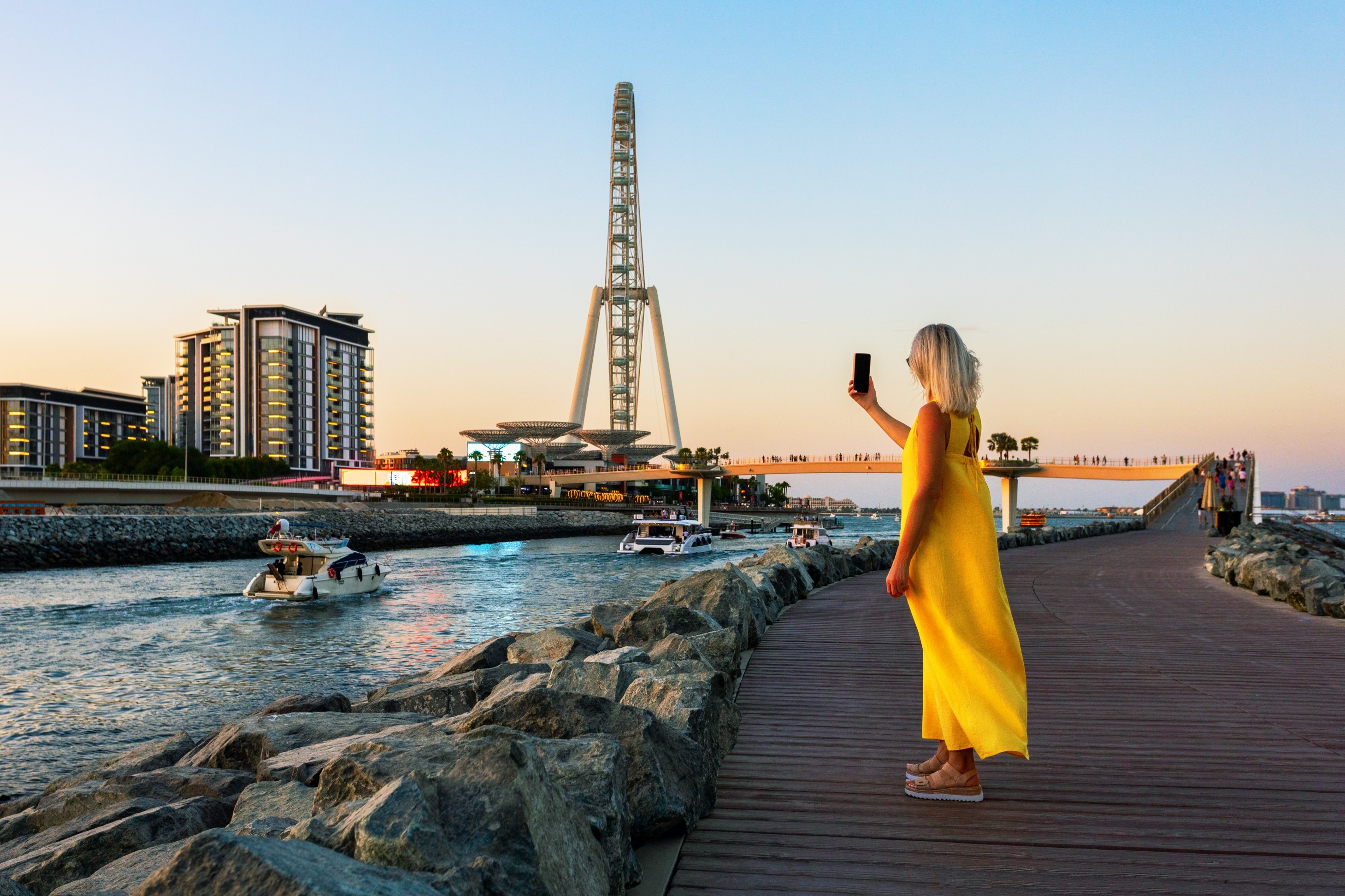 A woman enjoying budget- friendly activities in Dubai.