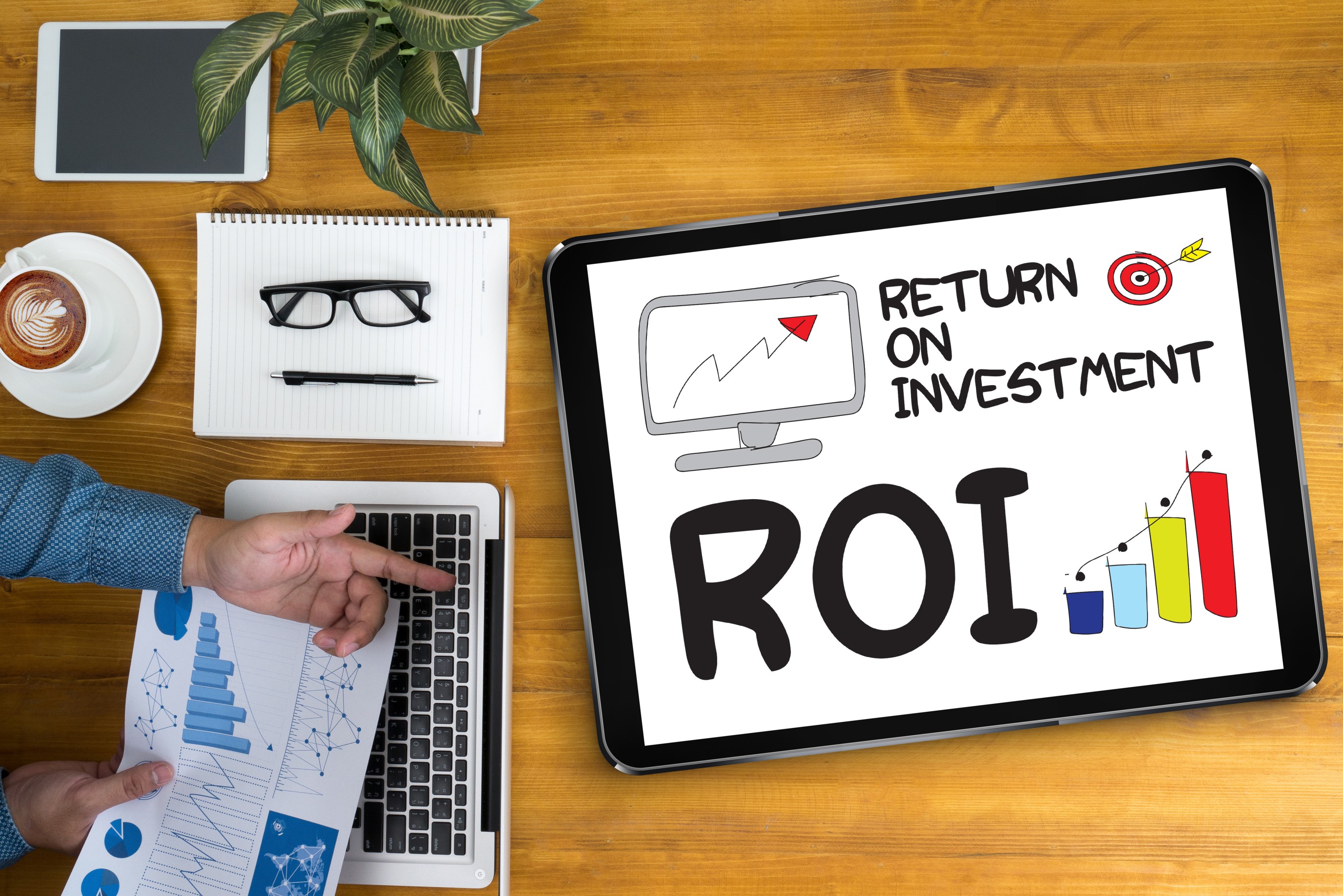 Real estate agent discussing ROI (Return on Investment)